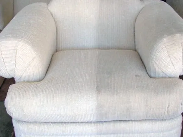 Upholstery cleaning on a fabric sofa